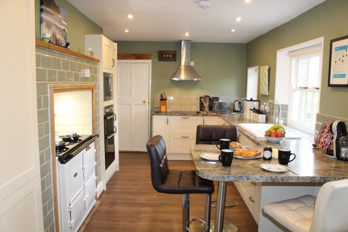 Helena - Kitchen with breakfast bar, Aga, double oven, microwave and hob